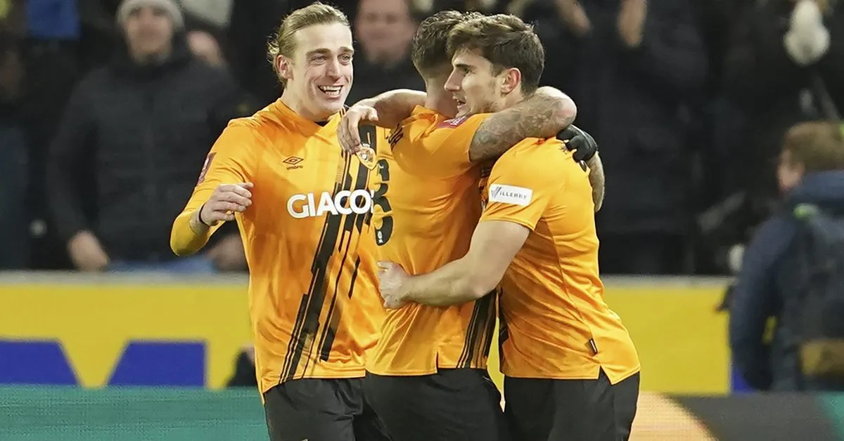 <p>Hull City&#8217;s Ryan Longman, right, celebrates after scoring his side&#8217;s second goal during the English FA Cup third round soccer match between Hull City and Everton at the MKM Stadium in Hull, England, Saturday, Jan. 8, 2022. (AP Photo/Jon Super)</p>
